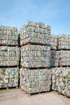 Bundles of consumer waste metal stacked for shipping to recycling facilities