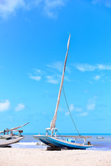 Naklejka premium sailboat on the sea, background, beach background, sail boats