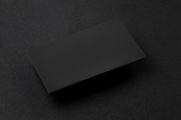 identity design in black, corporate templates, company style, business cards on a black background