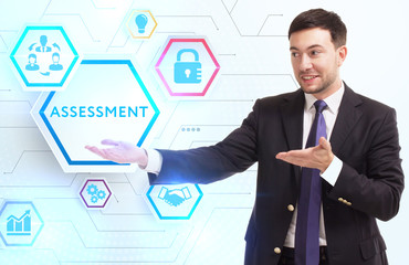 Business, Technology, Internet and network concept. Young businessman working on a virtual screen of the future and sees the inscription: Assessment