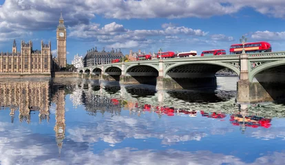 Foto op Aluminium Big Ben and Houses of Parliament with red buses on the bridge in London, England, UK © Tomas Marek