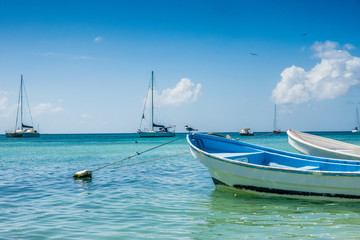 Botes anchored on the beach at Los Roques National Park, Venezuela