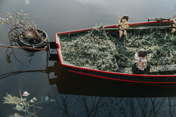 boat in canal  with puppets
