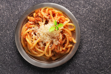 Pasta spaghetti with tomato sauce cheese,  basil leaf