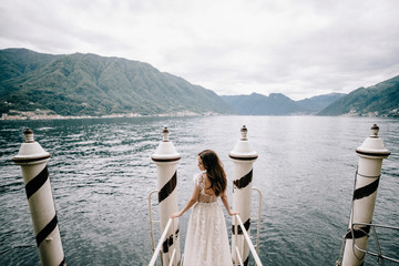 Young caucasian bride on Como lake  in Italy