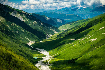 Fototapeta na wymiar Colorful summer landscape of Adishi valley seen from Chkhutnieri pass, Upper Svaneti, Georgia.