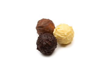 Chocolate truffle isolated on white background.