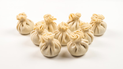 Khinkali on white background.