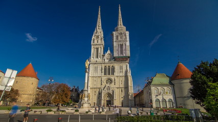 Fototapeta premium Zagreb Cathedral timelapse and Monument called Maria's pillar. ZAGREB, CROATIA