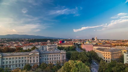 Fototapeta na wymiar Panorama of the city center timelapse shoot from top of the skyscraper with a view to the intersection in front of national theater and museum in Zagreb, Croatia.