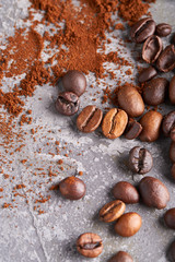 Food background Coffee beans on a gray stone table Vertical