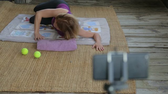 Fitness instructor making an online broadcast of her classes