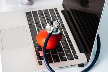 Stethoscope and heart toy with medical concept.