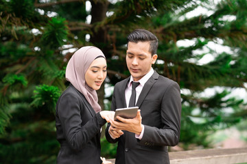 Lovely couple with corporate lifestyle and natural lighting.