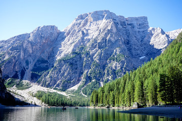 Fototapeta na wymiar Braies lake in Trentino Alto Adige, Italy, Dolomites in the background