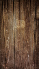 The brown background of the lined wood texture. Wood texture background top view, sharp and highly detailed