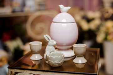 Easter dishes made of china on glass table