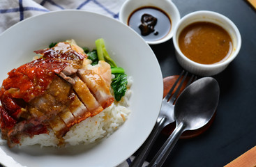 Rice roasted duck and crispy skin pork belly with gravy sauce