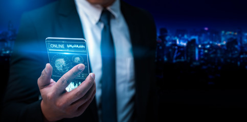 Businessman using mobile future smartphone and icon network connection data with growth graph hologram customer,digital marketing,planning analysis and strategy of business,banking and payment online.