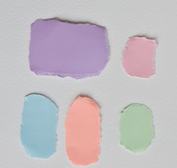 ripped pastel paper for text/word