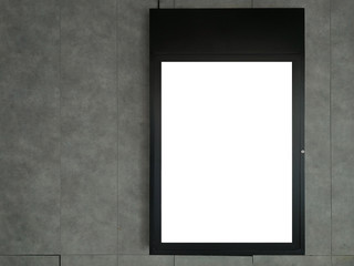 Black frame advertising signs with white background on bare cement or concrete wall