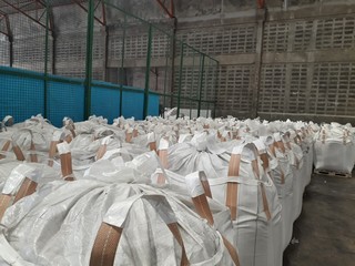 Chemical fertilizer Urea Stock pile jumbo-bag in warehouse waiting for shipment.