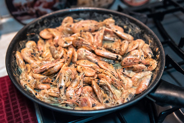 prawns shrimps are cooked on a pan