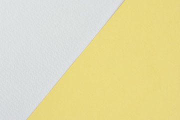 flat lay of pastel color paper in yellow