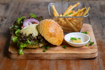 Hamburger with French fries Lettuce and Cheese
