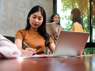 The visually impaired woman working at office,blurry light around