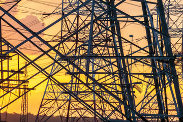 Pylon tower with orange sunset background