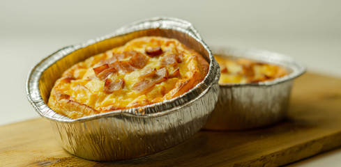 Quiche Lorraine, smoked bacon with medium  and mature cheddar cheese and egg quiche filling in a shortcrust pastry