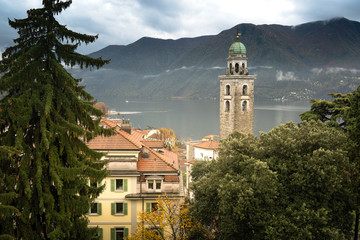 Switzerland. View of Cathedral of Saint Lawrence (in Italian: di San Lorenzo) and Lake Lugano .