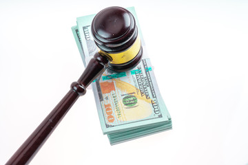 Gavel hammer and banknote with white background