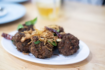 Deep fried spicy minced pork Thai name is Lab Moo Tod