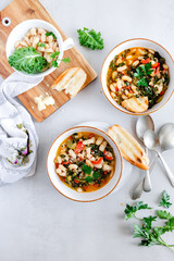 Winter soup with different vegetables, beans, kale, directly above. Typical Tuscan soup, Ribollita. Italian comfort food. - Image