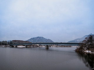Bridge over Lake Kawaguchiko in the atmosphere after snow has just fallen. January 27, 2020, Japan.