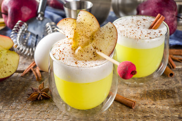 Apple cider sour card cocktail. Autumn Egg Flip alcohol beverage in shot glasses © ricka_kinamoto