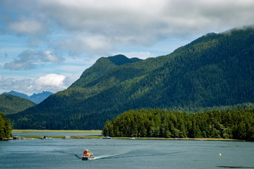 Adventure boat returning to the shore - Tofino, Vancouver Island, BC, Canada