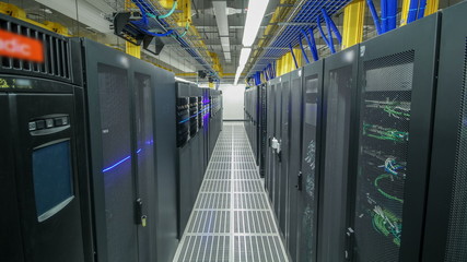 room with rows of server hardware in data center timelapse