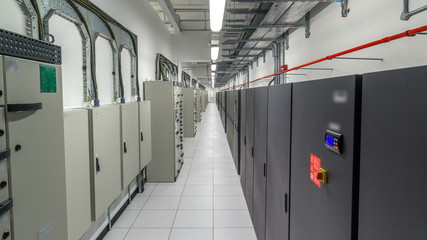 room with rows of server hardware in data center timelapse