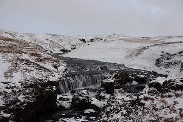 Wodospad zimą, Islandia