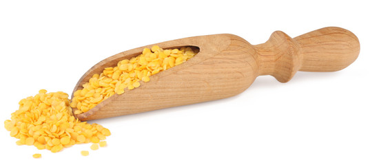 Lentils in a wooden cup isolated on white background