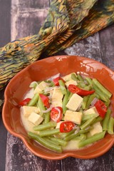 Buncis Tahu kuah santan or green bean tofu with coconut milk. Indonesian food.