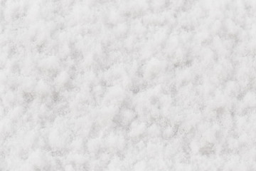 Texture of natural snow. Top view of the snow.