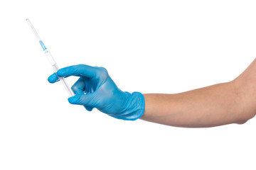 Close up of female doctor's hand in blue sterilized surgical glove with plastic medical syringe white background