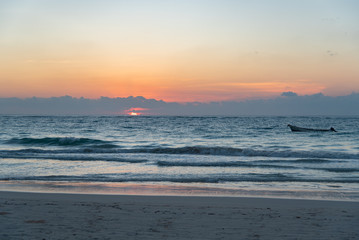 Fototapeta na wymiar Amazing view of sunrise at Tulum beach in Mexico North America