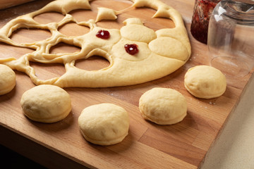 Preparation of homemade doughnuts filled with marmalade