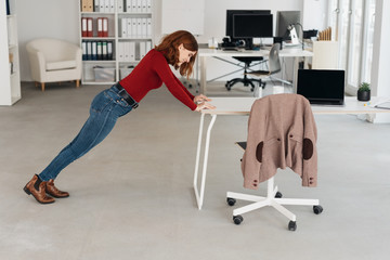 Businesswoman doing stretching exercises