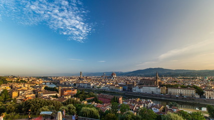 Fototapeta na wymiar Top view of Florence city timelapse at sunrise with arno river bridges and historical buildings